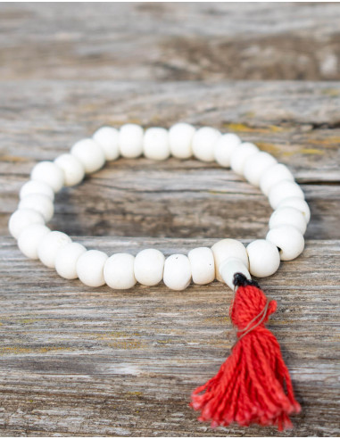 mala-pulsera-hueso-blanca-con-pompom