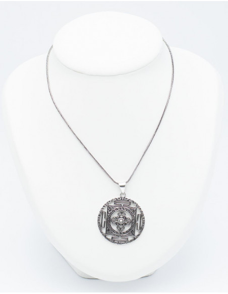 Openwork and carved pendant